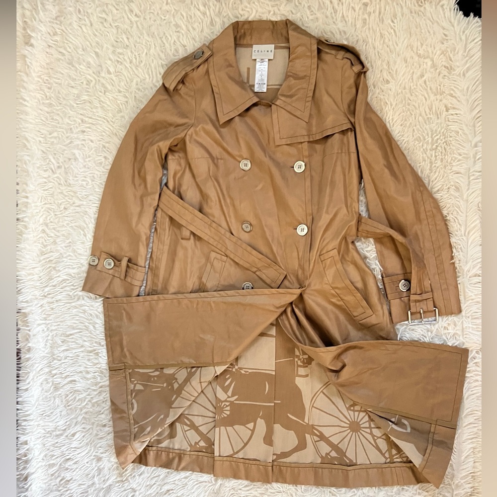 Celine trench coat size 40 light metallic weight trench coat. It’s blended silk.